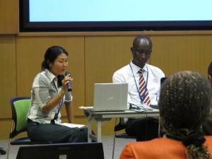 Ms. Yamane and Mr. Kantet in discussion with attendants